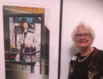 Cheryl Fausel in front of award winning painting